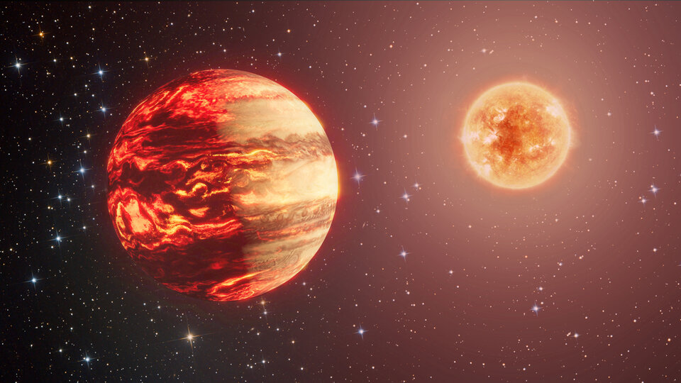 A large ball in the foreground is the focus of the image. The sphere has a brown-black colour with bright stripes and swirls of red and orange. To the top right of the image there is another smaller but brighter ball. This is white-yellow-orange in colour with thin and short, orange, filaments propagating outward. White spots dot the mostly black background, an orange-brown halo envelops the brighter ball.